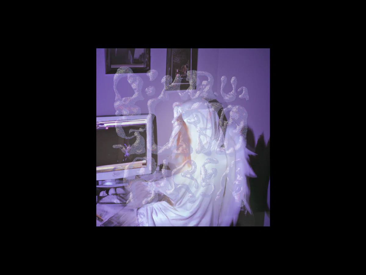 Wizard like figure, cloaked in white, sitting in front of a computer, with a purple and black background creating shadows in contrast